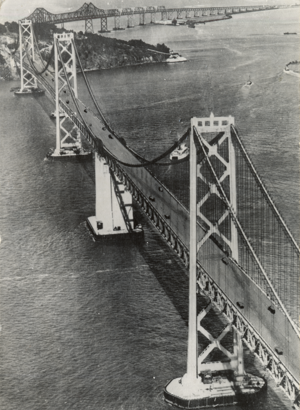 View of the Bay Bridge, looking from the San Francisco side toward Yerba Buena Island. Both the suspension and truss parts of the bridge are seen.