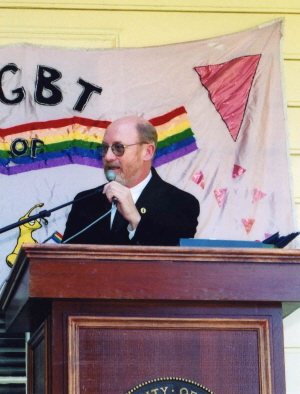 Man at podium giving a speech